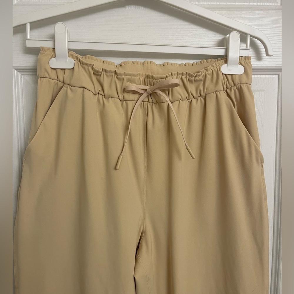 Lululemon, size 8 stretch high rise pant, lemon sorbet color